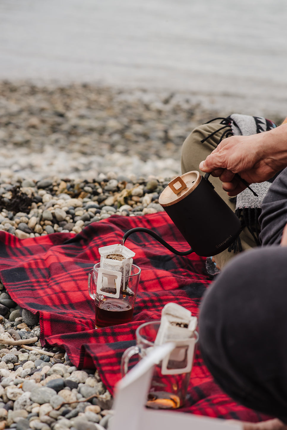 Drinking coffee on the beach